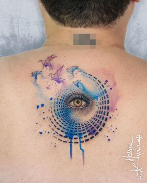 Delicate fine line design by artist Houssam featuring a mesmerizing mandala and eye motif in vibrant watercolor style.