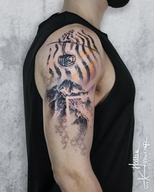 Explore the beauty of blackwork and fine line in this upper arm tattoo by artist Houssam. Featuring a stunning geometric mountain motif.