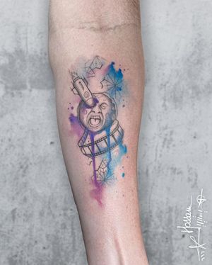 Experience the beauty of the night sky with this fine line, illustrative, and watercolor tattoo by the talented artist Houssam.