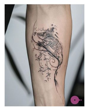 Beautiful blackwork tattoo combining a chameleon, tree, and leaf elements in fine line illustrative style by Nina.