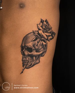 Skull and Rose tattoo done by Sanket Gurav at Circle Tattoo Studio