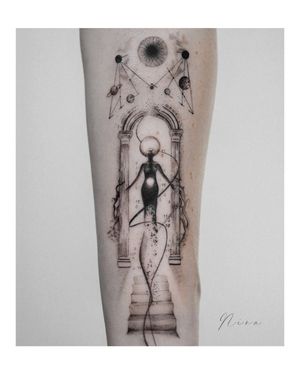 Elevate your style with this stunning blackwork forearm tattoo featuring a celestial motif of planets, galaxies, and a woman ascending a staircase to a mystical portal.