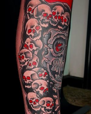Bold illustrative skull tattoo on lower leg by Shawn Nutting, perfect for lovers of blackwork style.