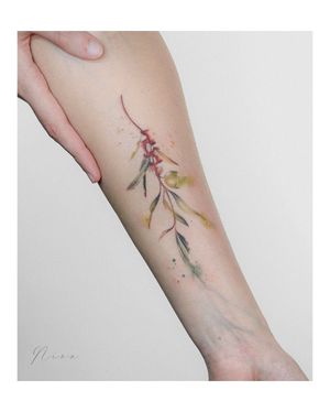 Elegant flower design on forearm by the talented artist Nina. Perfect blend of artistry and femininity.