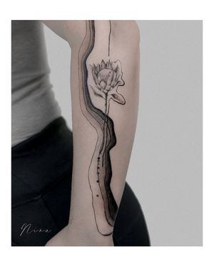 Impressive illustrative flower and pattern design by Nina, perfect for a bold statement on your forearm.