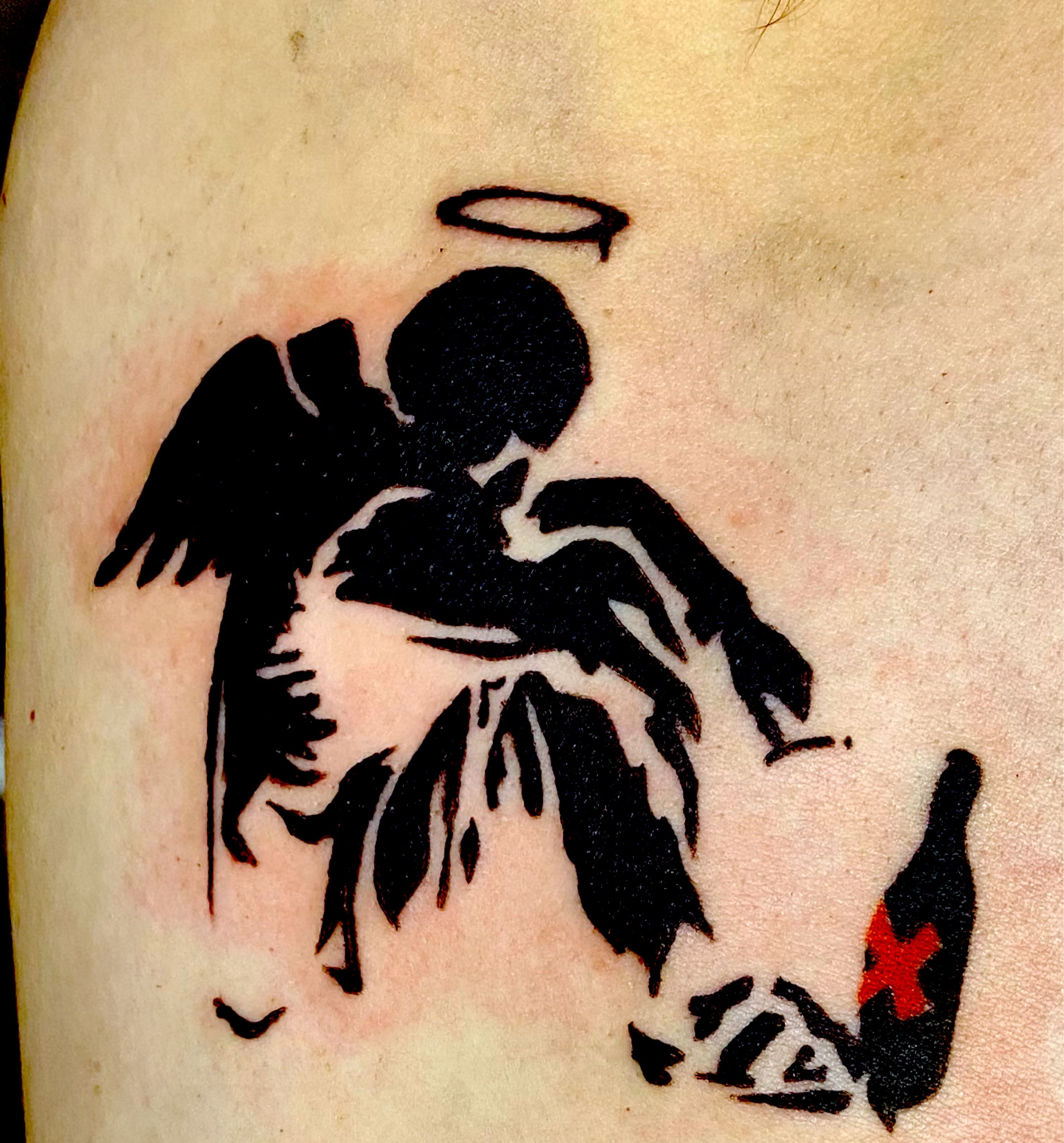banksy fallen angel tattoo