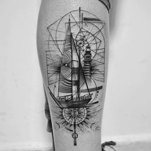 A unique blackwork design by Murat Yılmaz featuring a geometric compass and sword, beautifully blending fine line and ornamental details on the lower leg.