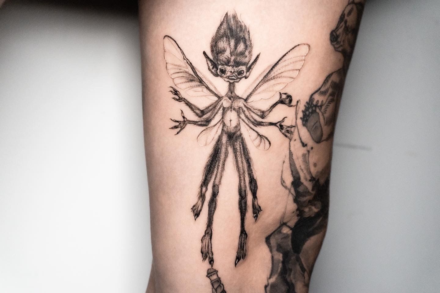 A happy little fairy tattoo with some peony and lotus florals. We added  this on to an existing thigh piece (which I did not do) I would ... |  Instagram