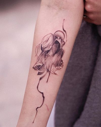 A stunning blackwork illustrative tattoo featuring a moon, wolf, and woman, created by Osman Ergin on the forearm.