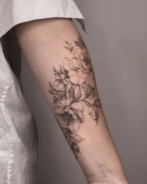 Blackwork peony flower tattoo on forearm by Nika Shvets, featuring intricate illustrative design.