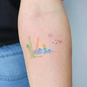 Get inspired by this fine line illustrative tattoo featuring a sun, flower, and cactus design by Tuğçe özbıyık.