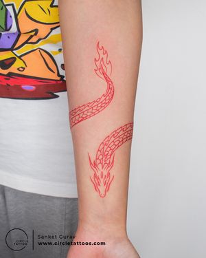 Red Ink Dragon Tattoo done by Sanket Gurav at Circle Tattoo Studio