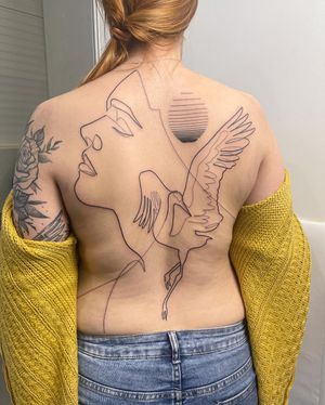 Detailed blackwork tattoo on back featuring a beautiful heron and a woman in an illustrative style by Dominika Gajewska.