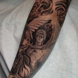 Get a stunning blackwork and realistic angel wings forearm tattoo in Chicago for a heavenly look.