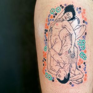 Fine line tattoo of a man and woman surrounded by delicate flowers, by Magdalena Sawicka. Perfect for arm placement.