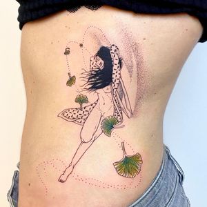 Beautiful dotwork and fine line piece by Magdalena Sawicka, showcasing a woman and leaf design on the ribs.