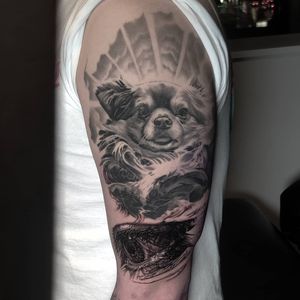 Capture the loyalty and visionality of a dog with this black and gray illustrative tattoo on your upper arm in Chicago.