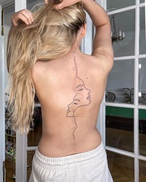 Unique blackwork and fine line tattoo by Dominika Gajewska, featuring a beautiful woman design on the back.