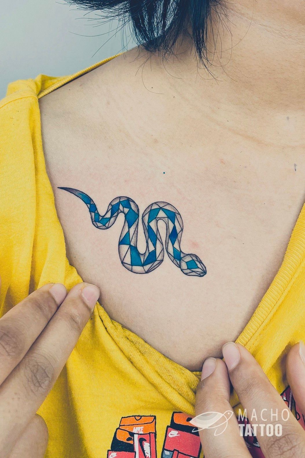 Small snake wrapped around a crescent moon, simple and elegant, more moon  than snake tattoo idea | TattoosAI