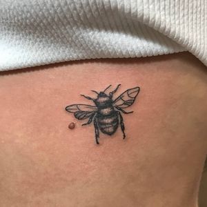 Elegant and intricate bee design by Sean Ross Fawkes, perfect for ribs placement. Embrace your inner queen bee!