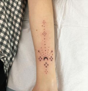 Unique blackwork and dotwork design by Natalie Lucia featuring moon, stars, and intricate geometric patterns.