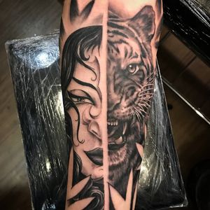 Stunning blackwork design by Sean Ross Fawkes, featuring a fierce tiger and mystical woman in an illustrative style.