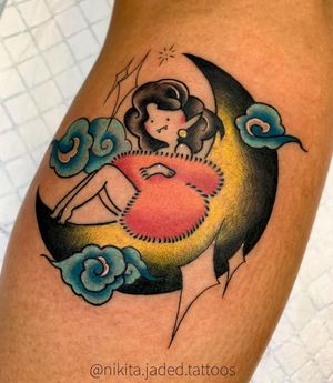 Capture the magic of the night with this traditional forearm tattoo featuring a moon, girl, and cloud by Nikita Jade Morgan.