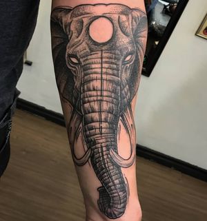 Check out this striking blackwork elephant tattoo by Sean Ross Fawkes, beautifully done on the forearm.