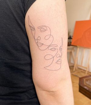 Unique illustrative design by Dominika Gajewska featuring a woman and man on the upper arm.