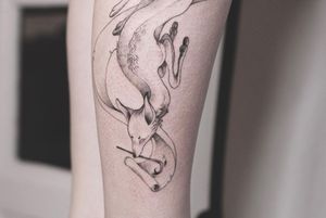 Unique blackwork and illustrative tattoo of a fox, expertly done by Lena Dabska on the lower leg.