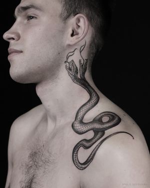 Embrace the mystical allure of a blackwork snake tattoo on your neck, expertly crafted by Mara's illustrative style.