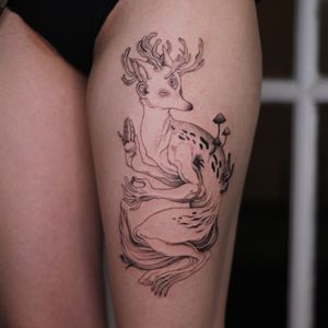 Unique blackwork tattoo on upper leg by Lena Dabska featuring a fox with horns and mushroom design. Fine line and illustrative style.