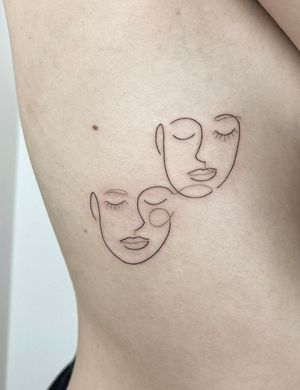 Beautiful illustrative tattoo of a woman on ribs by Dominika Gajewska.