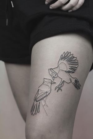 Unique blackwork tattoo of a bird by Dominika Gajewska, beautifully designed for the upper leg placement.