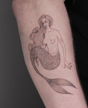 Blackwork and fine line tattoo of a beautiful mermaid woman, by Lena Dabska.