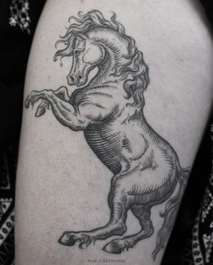 A beautifully detailed illustrative horse tattoo on the upper leg, done by the talented artist Mara.