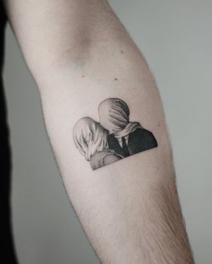 Express your love with this bold blackwork tattoo of a kiss by artist Dawid Szubert. Perfect for the forearm.