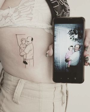 Unique fine line tattoo by Martyna Śliwka capturing a special moment between a child and adult