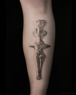 Get a stunning black & gray pattern tattoo done by Mara on your shin for a unique and eye-catching look. Embrace the artistry!