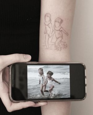 Capture the serene beauty of a beach scene with this delicate and illustrative forearm tattoo by Martyna Śliwka.