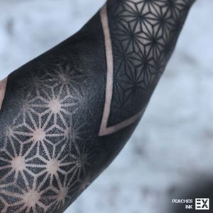 Dark geometric sleeve by Peaches Ink