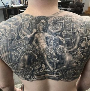 Get a stunning black and gray tattoo of angel wings on your back in Long Beach, US. Realistic and illustrative style with a touch of blackwork.