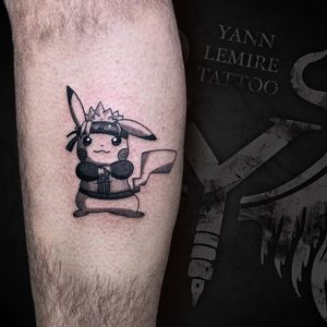 Get electrified with this blackwork illustrative tattoo of Pikachu showing off its karate skills, by Yann.