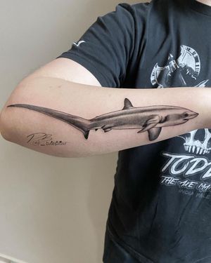 Impressive blackwork and illustrative tattoo of a shark on forearm by Patrick Bates
