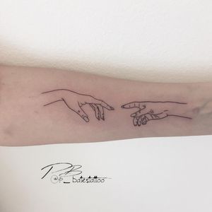 Get a stunning and intricate hand tattoo on your forearm by the talented artist Patrick Bates. The fine line work and illustrative style will make this piece truly unique.
