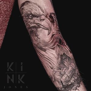 Get a stunning black and gray sleeve tattoo featuring a man merging into an eagle, expertly done by artist Jones.