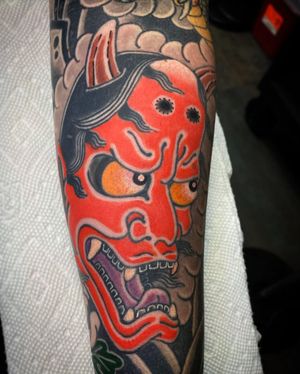 Get a striking Japanese-style forearm tattoo featuring hannya with horns by tattoo artist Eddy Ospina.