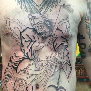 Intricate Japanese design by renowned artist Ami James featuring a samurai, sword, and kanji on the stomach.