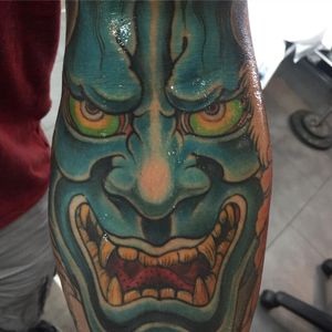 Experience the haunting beauty of a Hannya tattoo by renowned artist Ami James on your forearm.