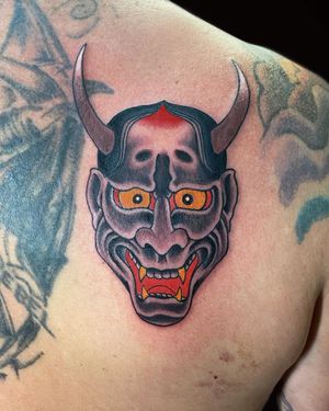 Exquisite shoulder tattoo by artist Eddy Ospina, featuring traditional Japanese motif of Hannya and Hons.